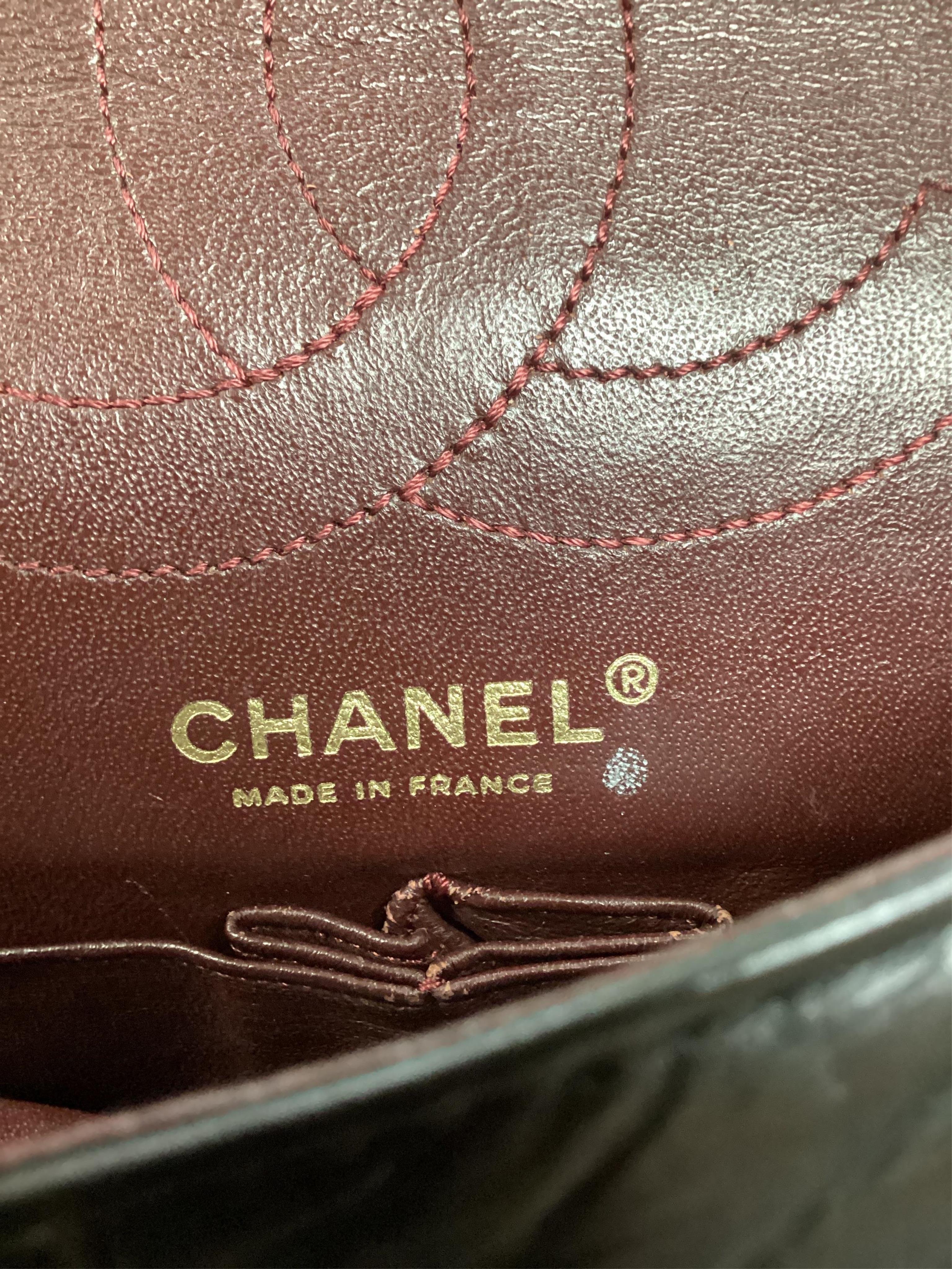 A Chanel 2.55 black leather handbag